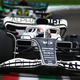A photo of Pierre Gasly racing lewis Hamilton in Italy.